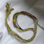 Sukh lucky charm cord bracelet in orange