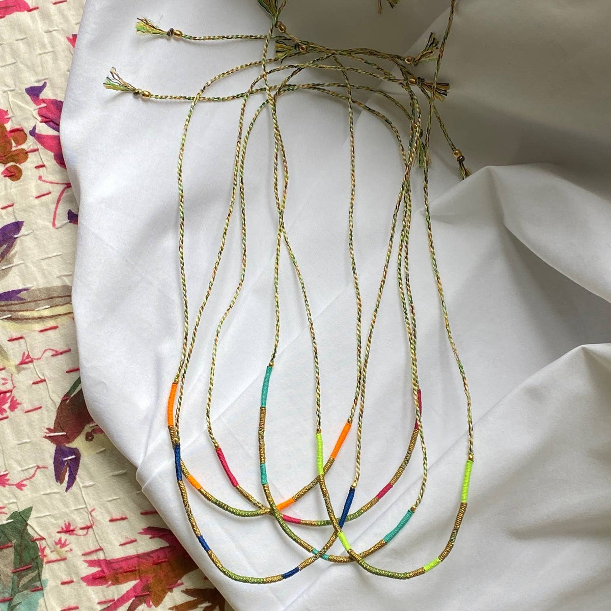 Sukh lucky charm cord bracelet: LIGHT GREY