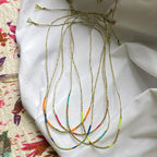 Sukh lucky charm cord bracelet