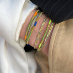 Sukh lucky charm cord bracelet in orange