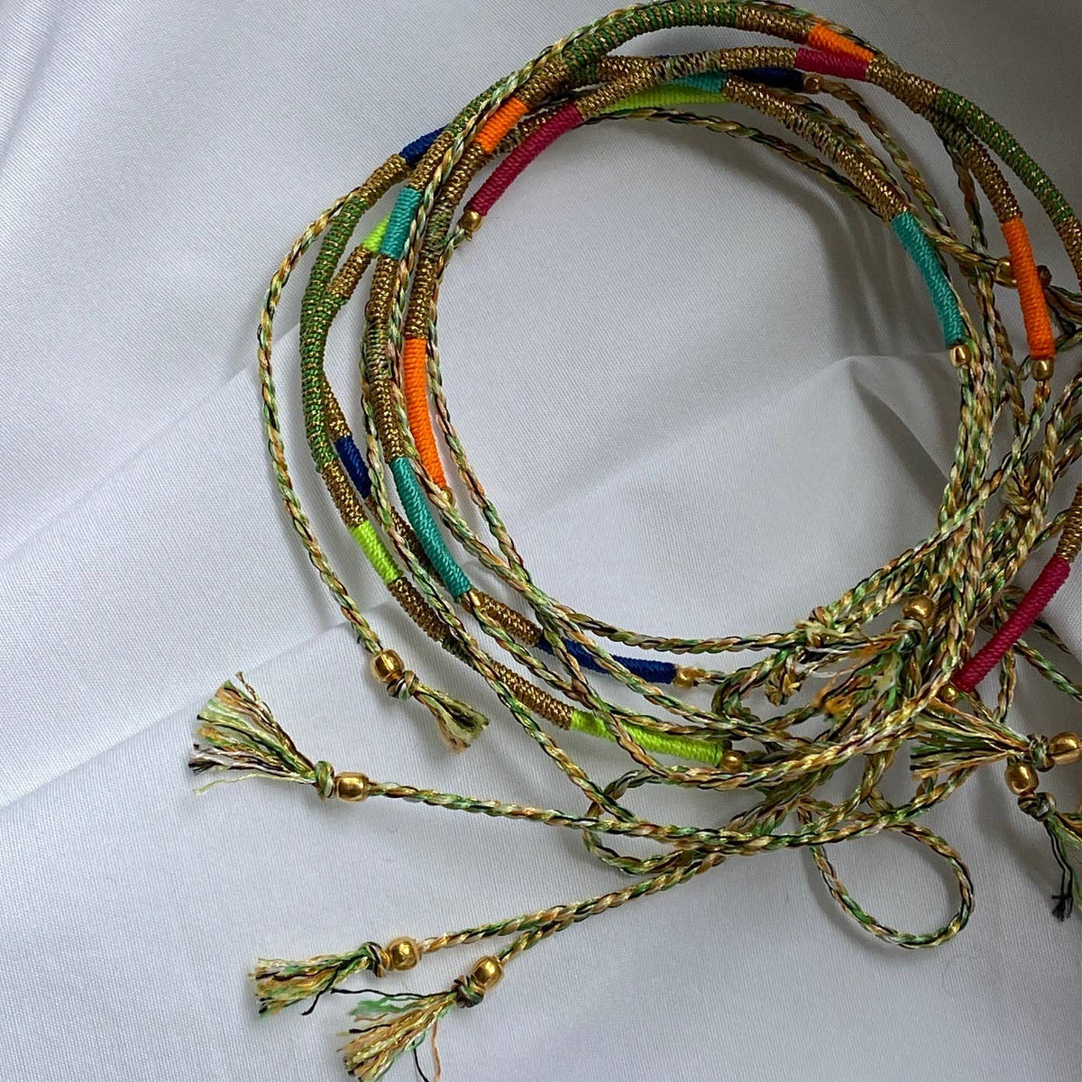 Sukh lucky charm cord bracelet: LIGHT GREY